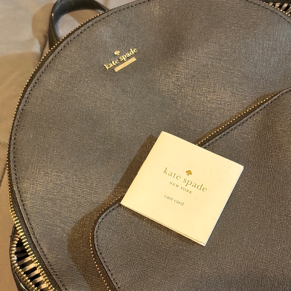 Kate Spade Gray Backpack with Gold Accents